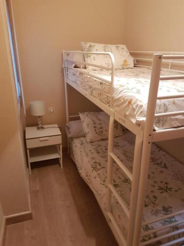 Posteľ alebo postele v izbe v ubytovaní TRIANA PUREZA 1