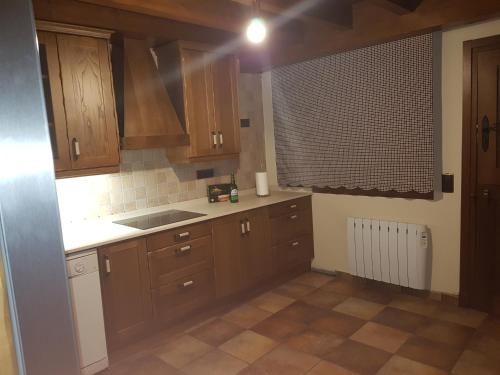 A kitchen or kitchenette at Casa el nene