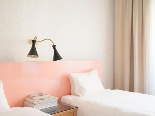 Postel nebo postele na pokoji v ubytování Hotel Am Brillantengrund