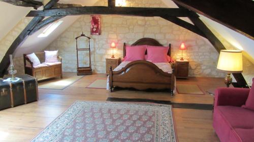 Ein Bett oder Betten in einem Zimmer der Unterkunft Les Vallées