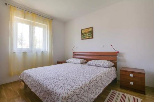 Lova arba lovos apgyvendinimo įstaigoje Apartment Vitalia 2+2