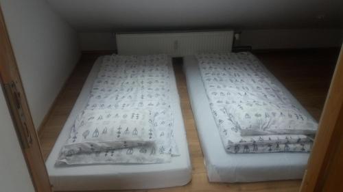 Posteľ alebo postele v izbe v ubytovaní Apartament Karpielówka