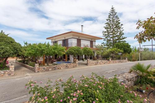 a house on the side of the road at Ta Ambelakia in Monemvasia