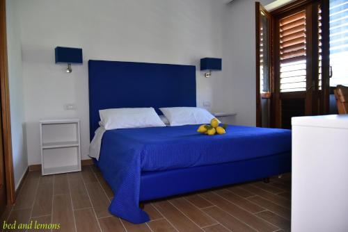 Postel nebo postele na pokoji v ubytování Bed and Lemons