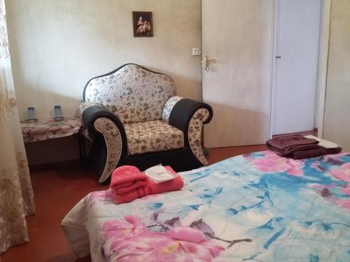 Ein Bett oder Betten in einem Zimmer der Unterkunft Shushan GUEST HOUSE