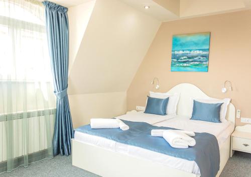 Кровать или кровати в номере Family Hotel Belle Epoque Beach