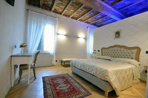 Ένα ή περισσότερα κρεβάτια σε δωμάτιο στο Antica Dimora