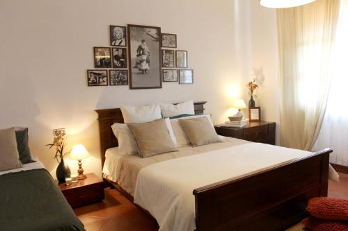 Säng eller sängar i ett rum på B&B La Foglia Verde