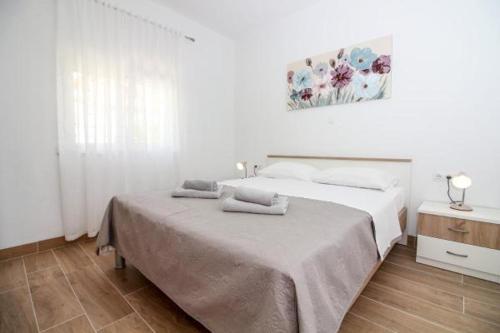 Postel nebo postele na pokoji v ubytování Mara