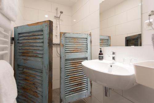 Een badkamer bij HOTELdeBEAUTEL