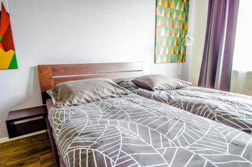 a bedroom with two twin beds in a room at HOTEL 63 in Poprad