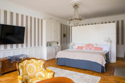 Un ou plusieurs lits dans un hébergement de l'établissement Hotell Breda Blick
