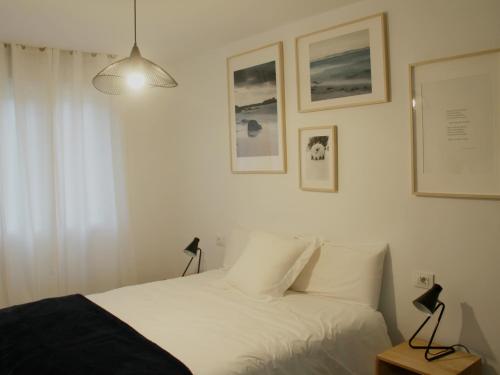 Ένα ή περισσότερα κρεβάτια σε δωμάτιο στο Apartamento Lapamán