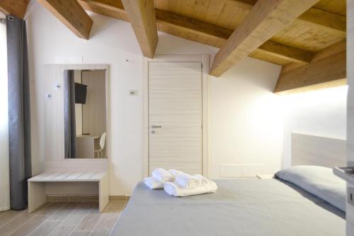 Postel nebo postele na pokoji v ubytování B&B Santa Lucia, Rapolla