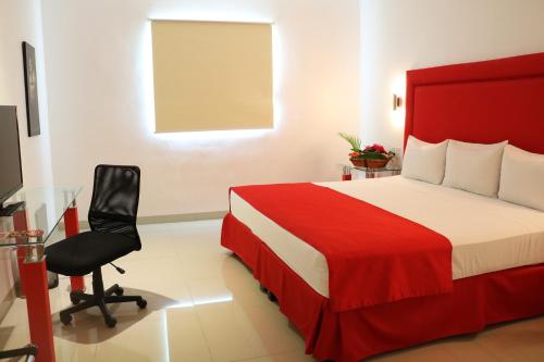 Postel nebo postele na pokoji v ubytování Hotel Zar Merida