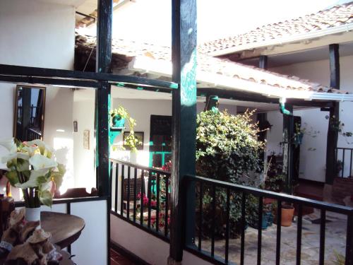 a view from the balcony of a house at Hotel Hacienda El Aserrio in Iza