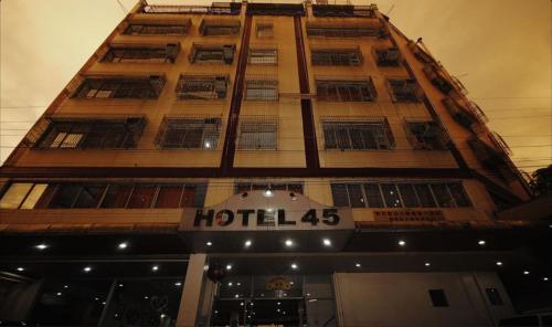 a tall building with a hotel sign on it at Hotel 45 in Baguio