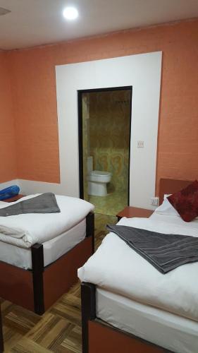 Cama o camas de una habitación en BnB Royal Tourist House