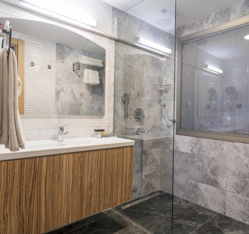 Koupelna v ubytování Greymark Hotel