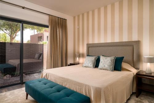 Giường trong phòng chung tại Vilamoura Charming Apartment by Intiholidays