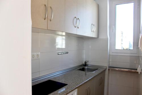 Una cocina o zona de cocina en Atico Armengual Suite Málaga
