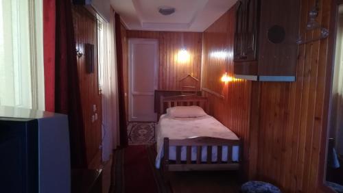 Ένα ή περισσότερα κρεβάτια σε δωμάτιο στο Guest House Nadejda