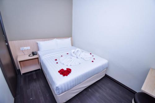Letto o letti in una camera di Eden Boutique Hotel
