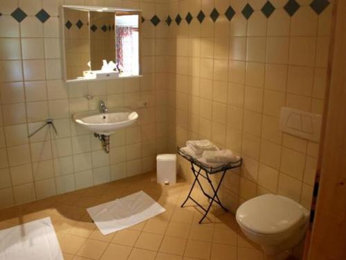 Et badeværelse på Landgasthof zum Scheiber