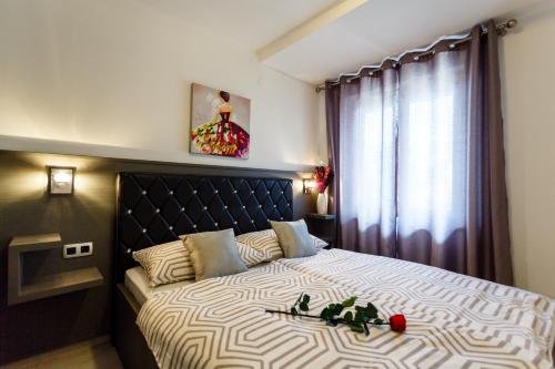 Postel nebo postele na pokoji v ubytování Villa Aria 1