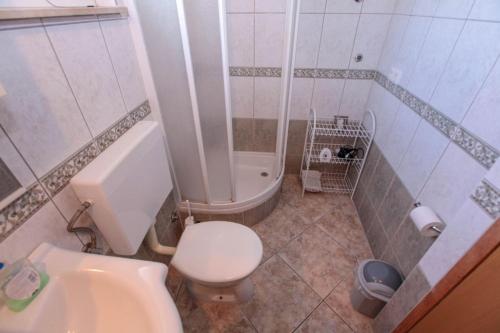 Koupelna v ubytování Apartments Mira