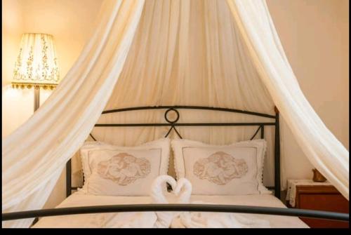 Llit o llits en una habitació de Villa Drakona