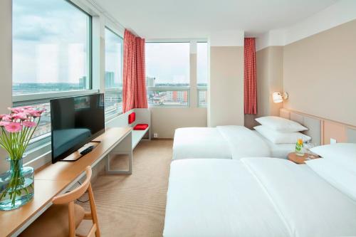 TV a/nebo společenská místnost v ubytování Hotel Altus Poznań Old Town - Destigo Hotels