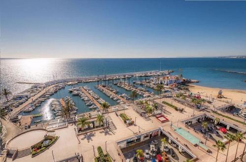 an aerial view of a marina with boats in the water at H Juan in Marbella