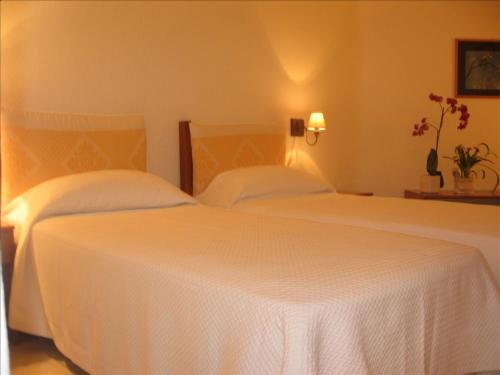 Postel nebo postele na pokoji v ubytování Hotel Valdiola
