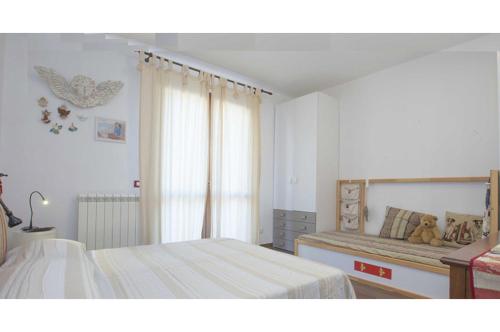 Een bed of bedden in een kamer bij la casa di anita