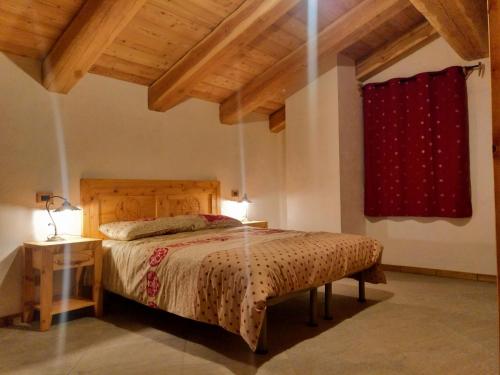 Ένα ή περισσότερα κρεβάτια σε δωμάτιο στο Delfin Dal Pianhol
