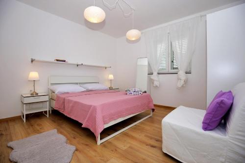 Ένα ή περισσότερα κρεβάτια σε δωμάτιο στο Apartments Ines