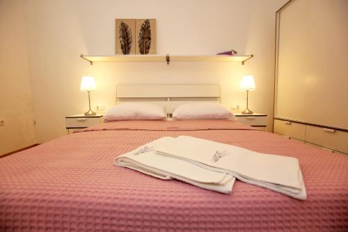 Ένα ή περισσότερα κρεβάτια σε δωμάτιο στο Apartments Ines