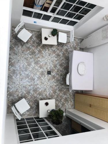 an overhead view of a kitchen with white appliances at Terrazas del Sur in Los Abrigos