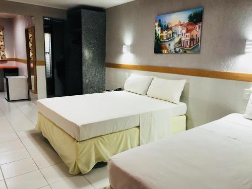 Cama ou camas em um quarto em Inter Hotel