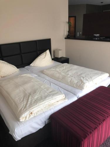 Cama o camas de una habitación en hotel zentlinde