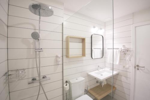 Ванная комната в Los Olivos Beach Resort