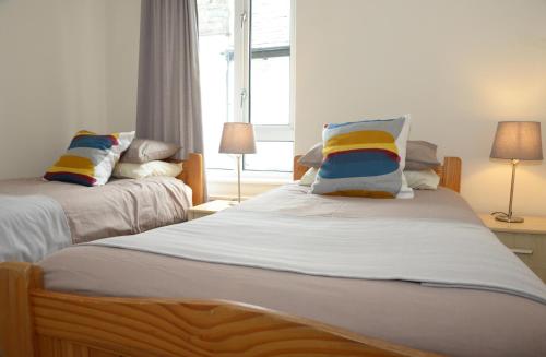 Ένα ή περισσότερα κρεβάτια σε δωμάτιο στο Gallt y Glyn Hostel