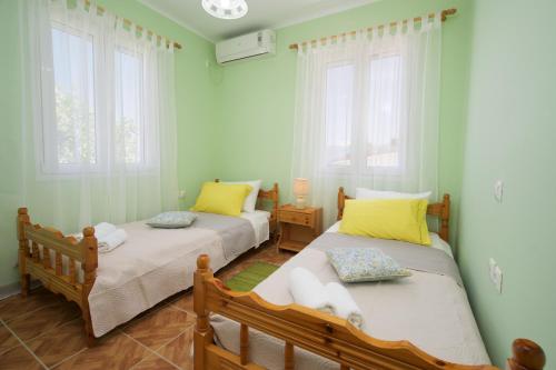 Ένα ή περισσότερα κρεβάτια σε δωμάτιο στο Venetia's House