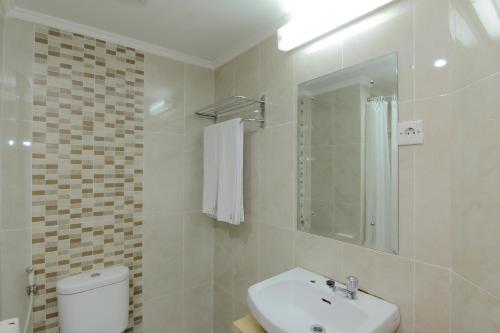 Koupelna v ubytování University Hotel Yogyakarta