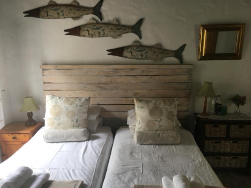 Postel nebo postele na pokoji v ubytování Carneddie Cottage - main