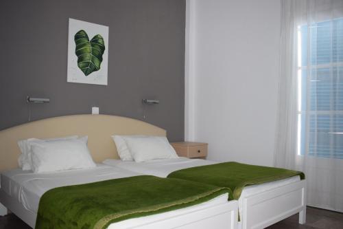 Posteľ alebo postele v izbe v ubytovaní Kalimera Studios and Apartments