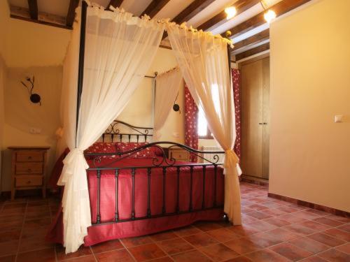 En eller flere senge i et værelse på Pago de Trascasas