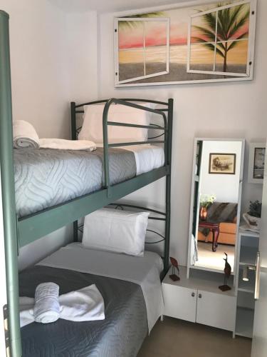 Postel nebo postele na pokoji v ubytování Villa Stella D'oro