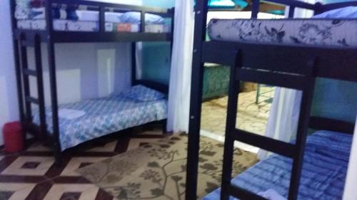 
A bunk bed or bunk beds in a room at Pousada Recanto Dom Lázaro
